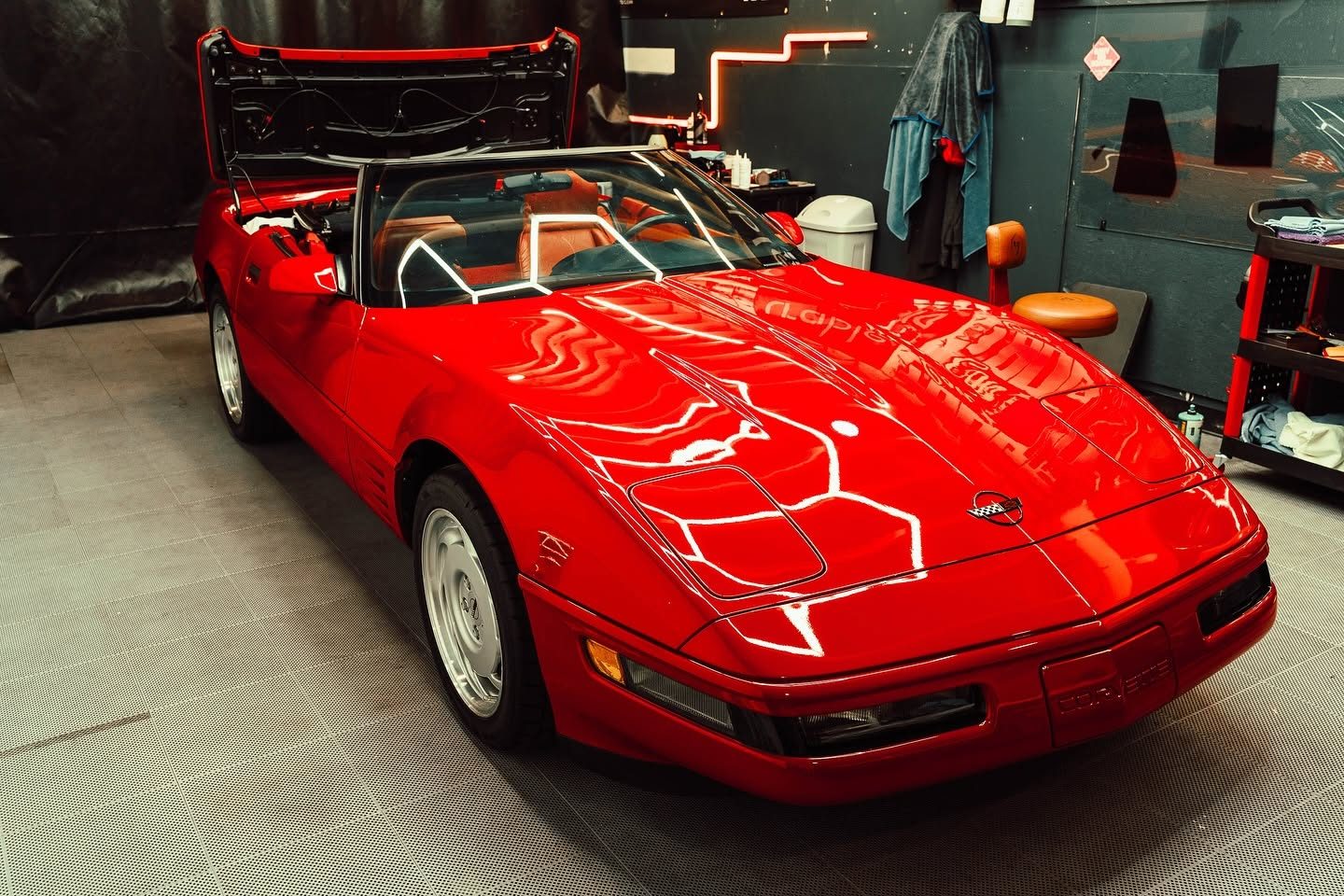 Corrected Corvette paint under hexagon shop lighting at Slick Auto Care in Little Rock AR