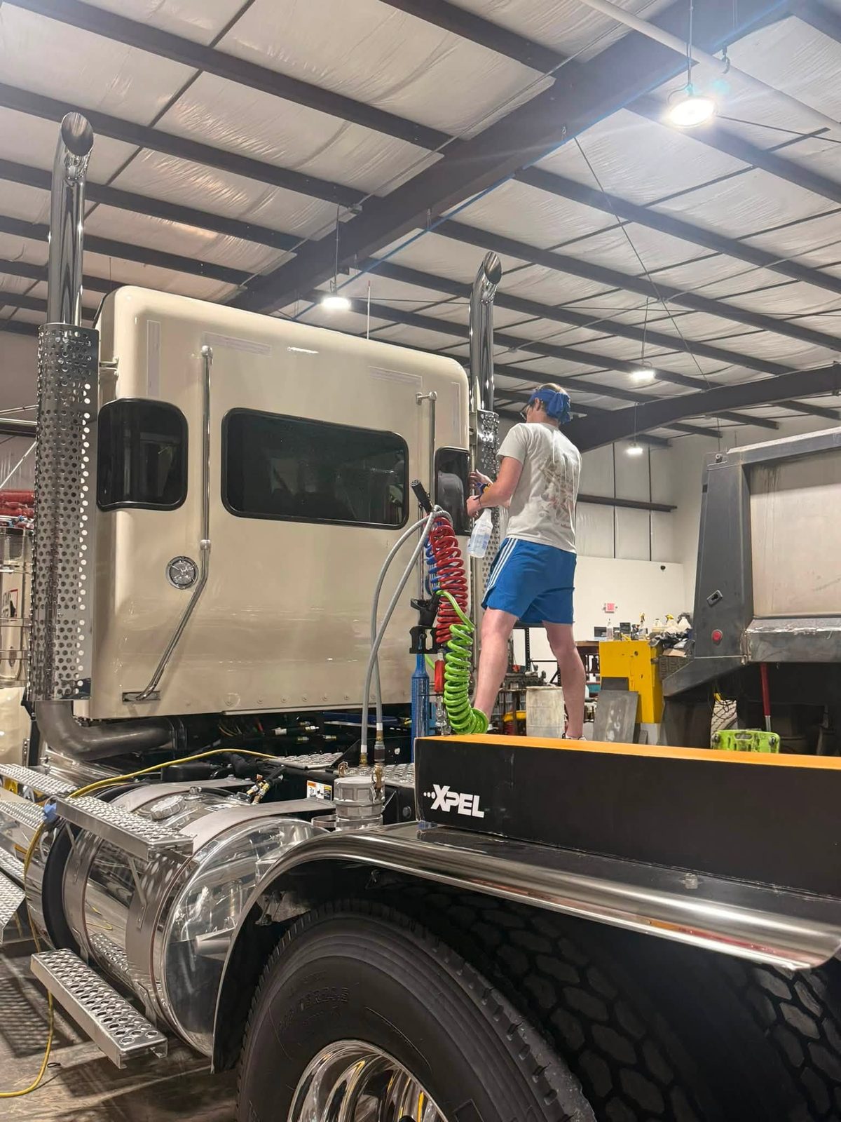 XPEL paint protection film being installed at Slick Auto Care in Little Rock AR